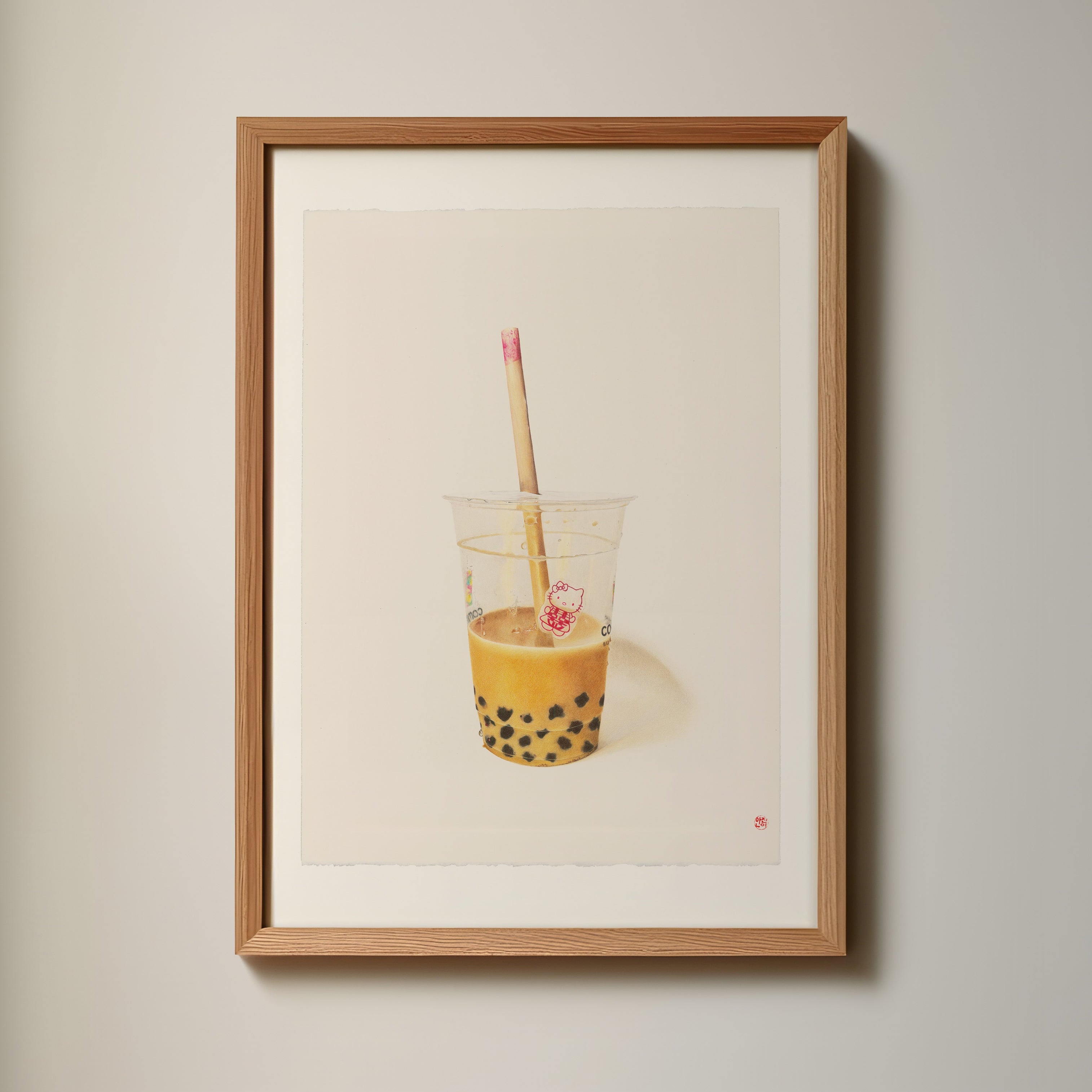 Mockup: Boba artwork framed in light wood