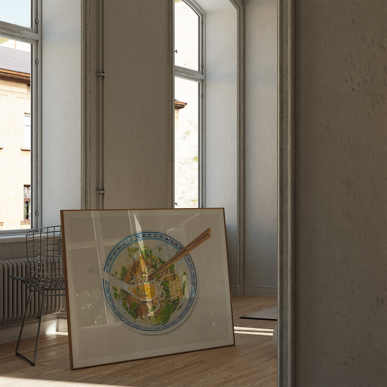 Framed original colored pencil drawing ‘Comfort Food’ by Jeanie Ahn in a modern living room with white walls and natural light.